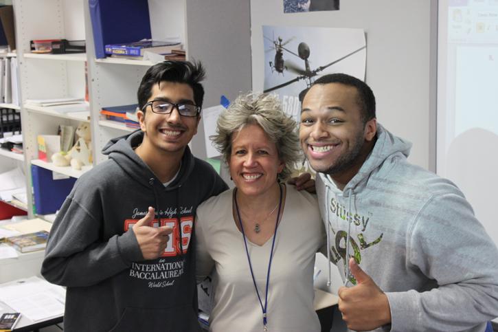 Teacher of the year Susan Schwertz with her period 6 students seniors Bryan Holden and Abid Naqvi