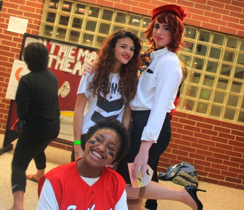 Drama club attracted a lot of attention with their game, pin the face on the actor, and their fun costumes, Drama club co-president Ashley Cauthen's (top left) costume was Lorde, Event planner Hayden Gnat's (right) costume was a flight attendant , co-prop shop manager Jessika Williams (bottom left) costume was a baseball player.