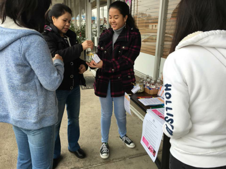 Nguyen, Ho and Bui getting people to donate to the Melanoma Research Fund.