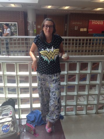 Senior Sarah Godfrey rocking out in her Wonder Woman P.J.s duirng Pajama Day. 