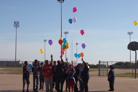 The Special Education department and their students release balloons  for a lost teacher that lost her life by getting hit by a vehicle.