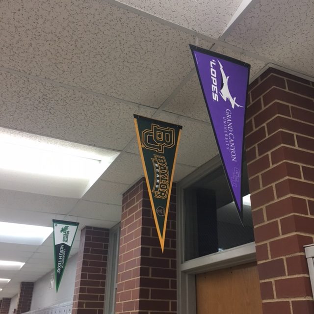 Teachers showing off their college pride. 