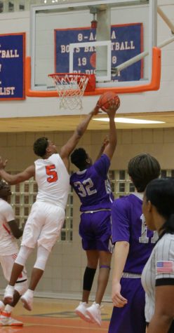 Donoven Davenport blocked a easy layup by Paschal during a blow out with of 74-43.